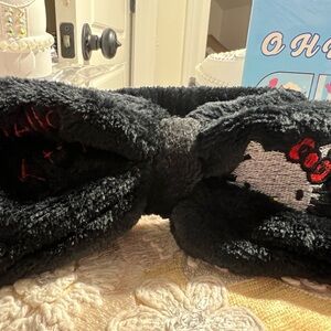 Hello Kitty Black Plush Bow Head Wrap with Red Bow Detail